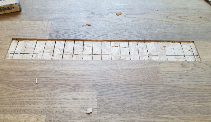 Decklamelle an Eiche Parkett ausbauen